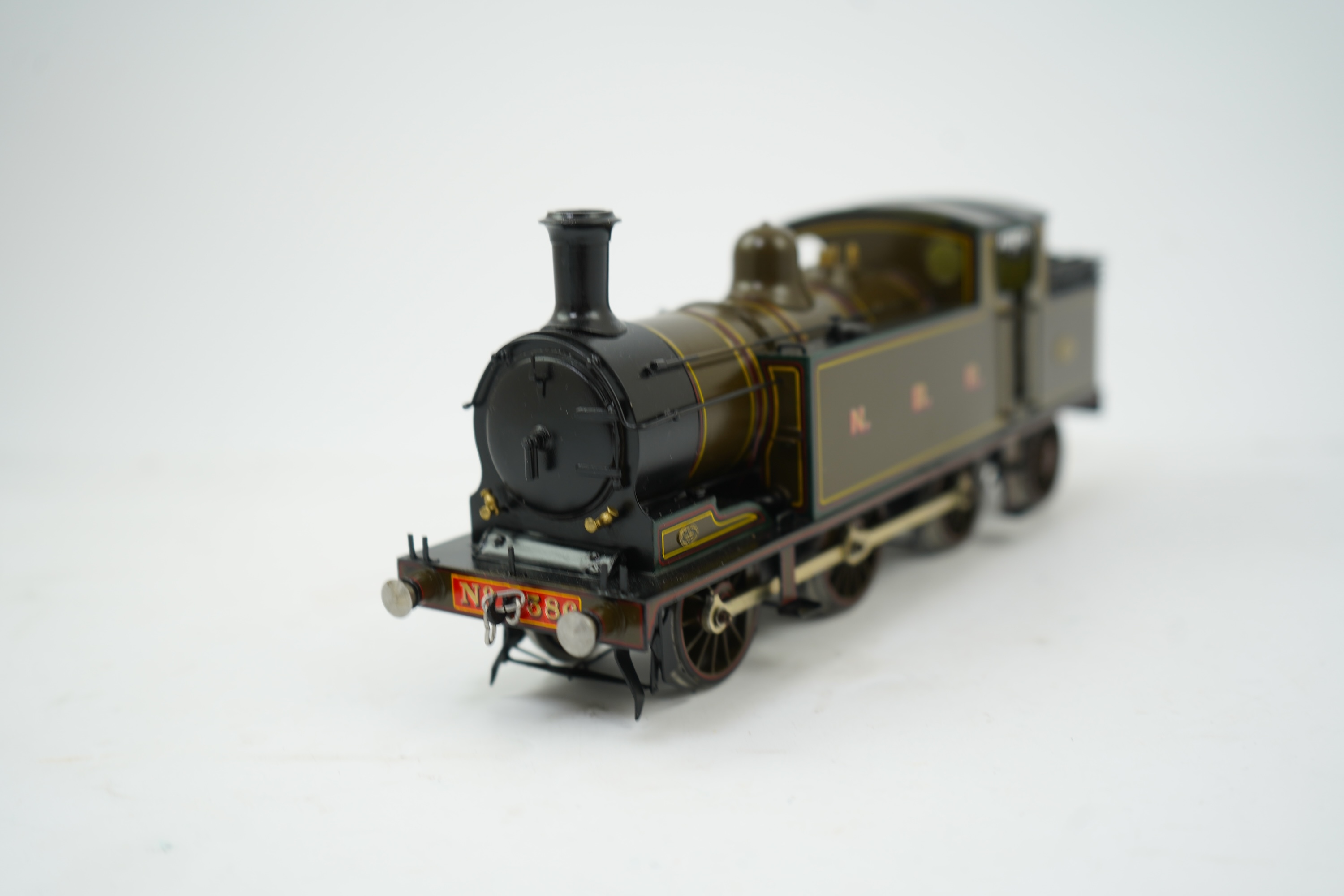 An 0 Gauge brass model of North British Railway William Reid Class A, 386, 0-6-2T locomotive, powered for two rail operation.